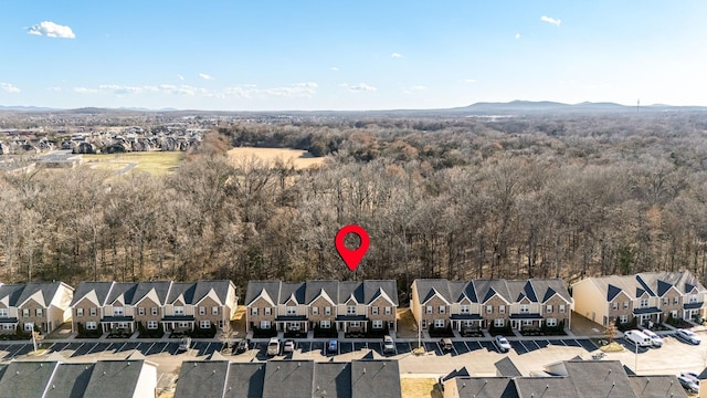 bird's eye view featuring a residential view and a mountain view