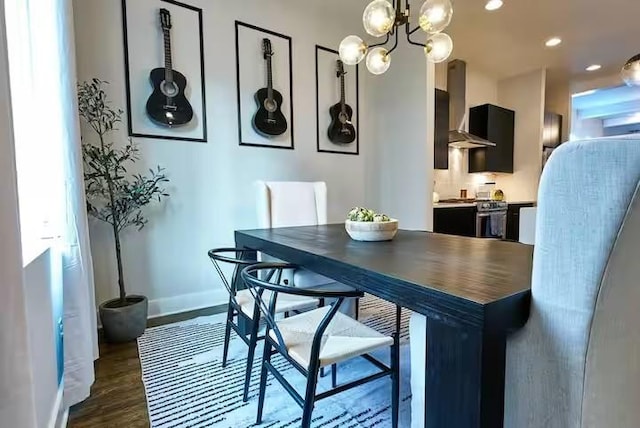 dining room featuring baseboards, dark wood finished floors, and recessed lighting