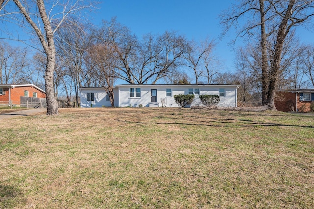 single story home with a front yard