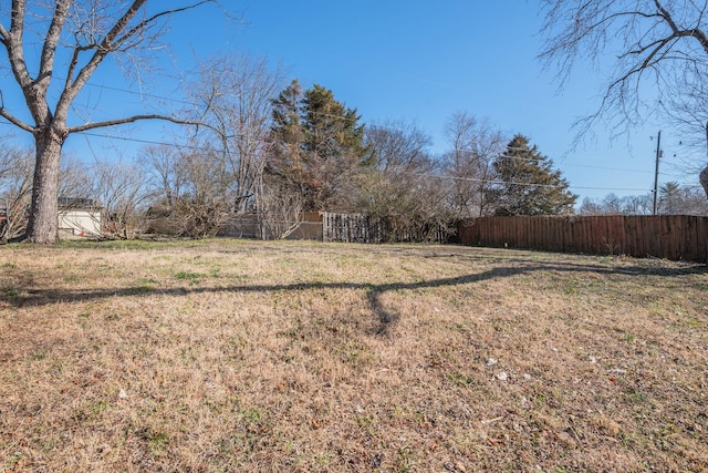 view of yard with fence