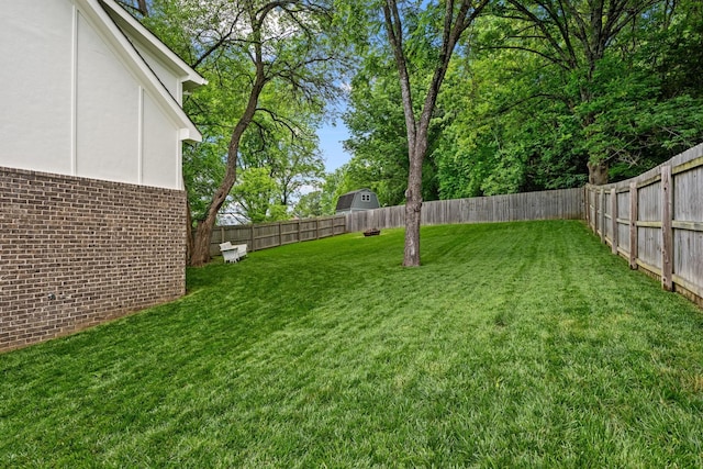 view of yard featuring a fenced backyard