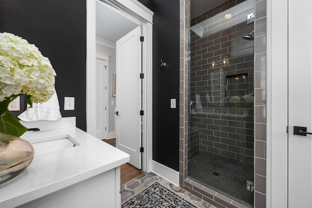 full bath featuring a shower stall and vanity