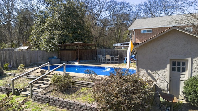 view of pool with a gazebo, a patio area, and a fenced backyard