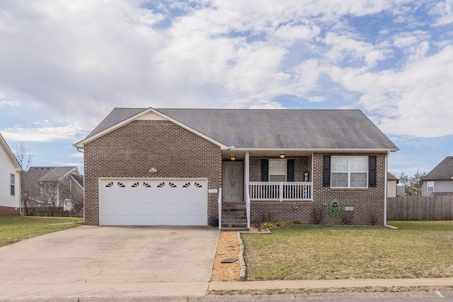 single story home featuring driveway, a garage, a front yard, a porch, and brick siding