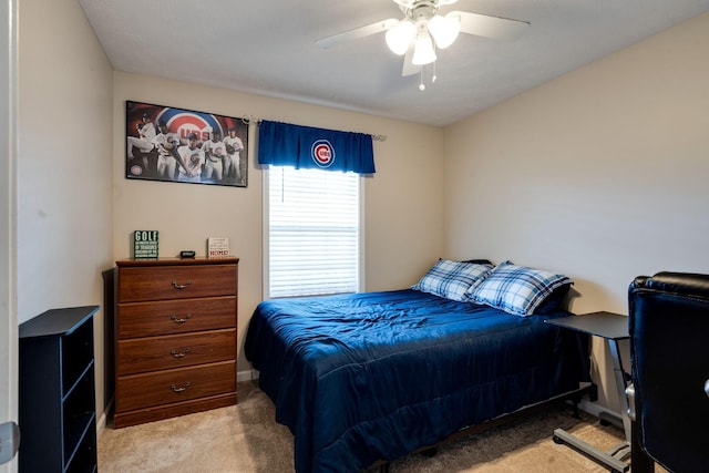 bedroom with carpet floors and a ceiling fan