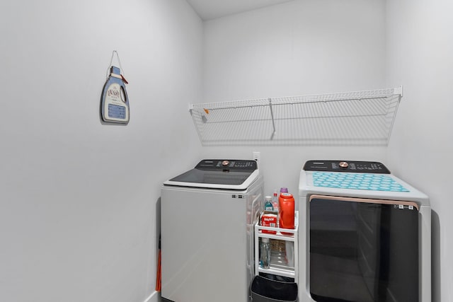 laundry room featuring laundry area and washer and clothes dryer