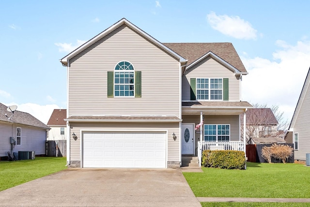 traditional-style home with a porch, a shingled roof, concrete driveway, an attached garage, and a front lawn