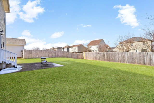 view of yard featuring a fenced backyard