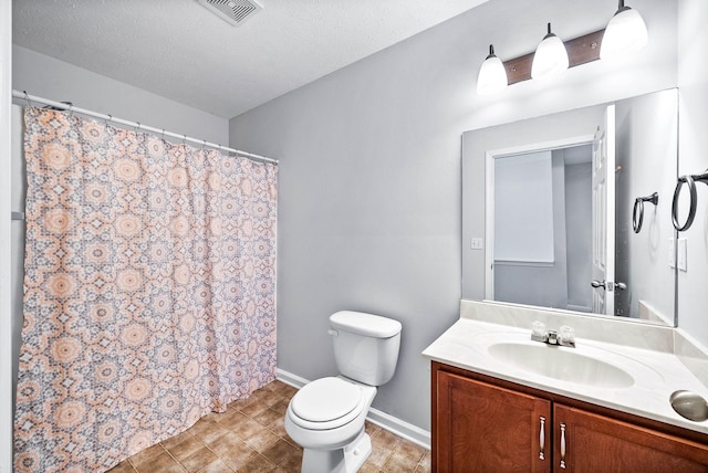 full bath with baseboards, visible vents, toilet, a textured ceiling, and vanity