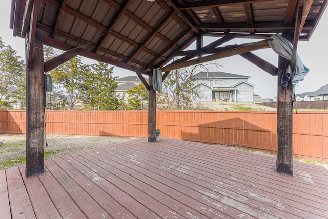 deck with a fenced backyard