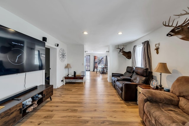 living room featuring recessed lighting and light wood finished floors