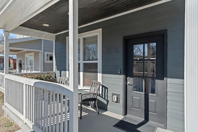 doorway to property featuring a porch