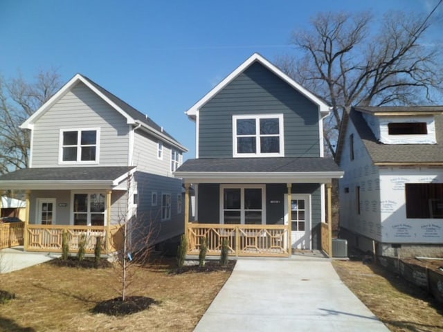 view of front of property featuring a porch and central AC unit