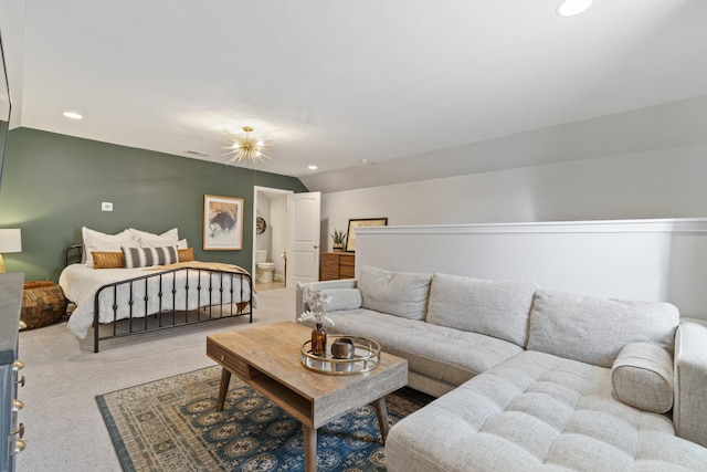 carpeted bedroom with visible vents, vaulted ceiling, and recessed lighting