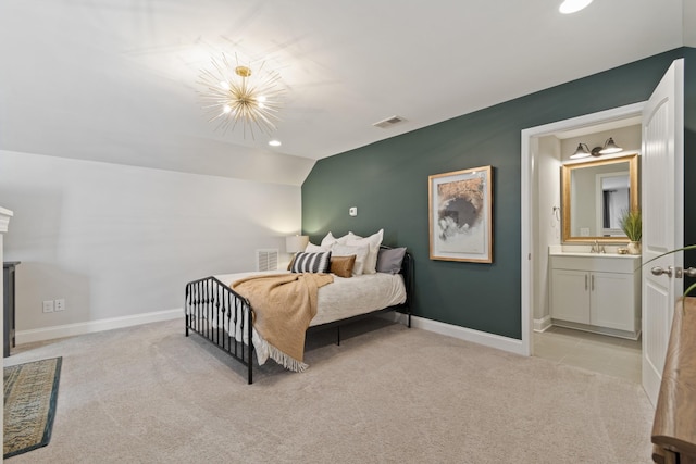 bedroom featuring lofted ceiling, light colored carpet, visible vents, and baseboards