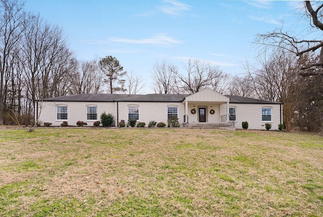 ranch-style home with a front yard