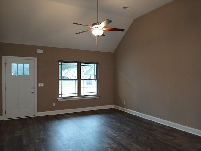 foyer featuring lofted ceiling, a ceiling fan, baseboards, and dark wood-type flooring