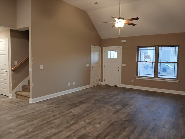 entryway featuring dark wood-style floors, a ceiling fan, baseboards, and stairs