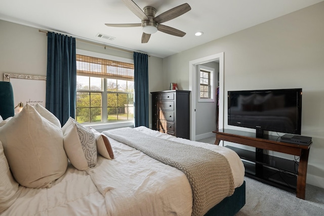 bedroom with recessed lighting, light colored carpet, visible vents, ceiling fan, and baseboards