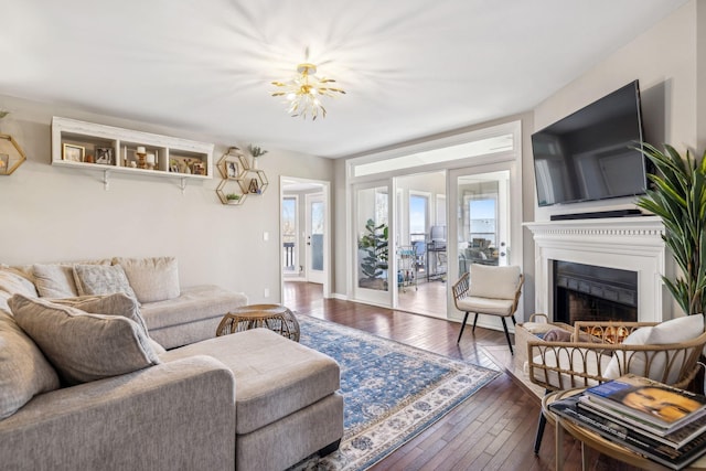 living area featuring a fireplace and hardwood / wood-style floors