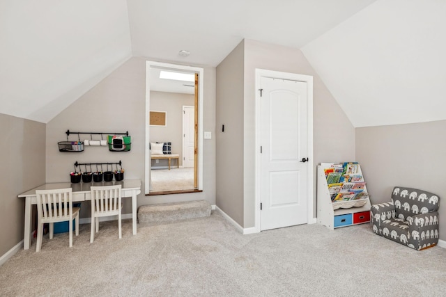 rec room with vaulted ceiling, carpet floors, and baseboards