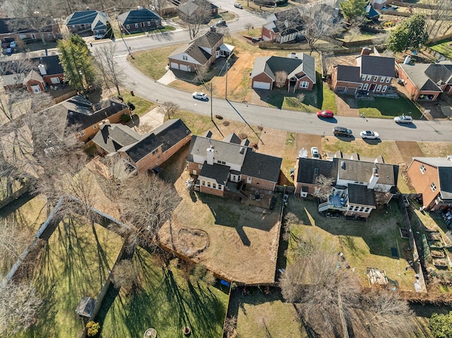 birds eye view of property with a residential view