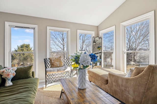 sunroom featuring lofted ceiling