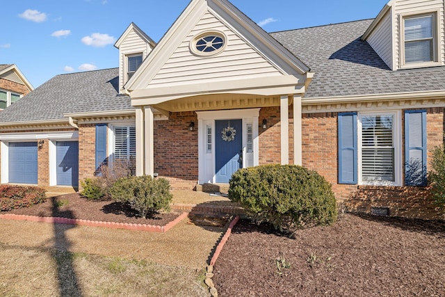 view of front of house with a garage, brick siding, crawl space, and a shingled roof