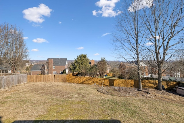 view of yard featuring a fenced backyard