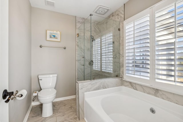 bathroom featuring a garden tub, toilet, visible vents, baseboards, and marble finish floor