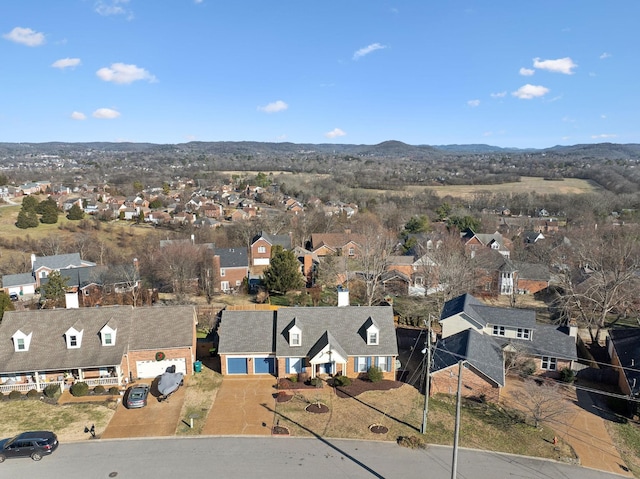 birds eye view of property with a residential view