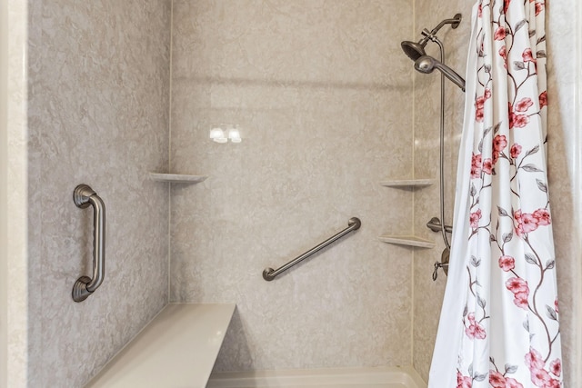 bathroom featuring a shower with curtain