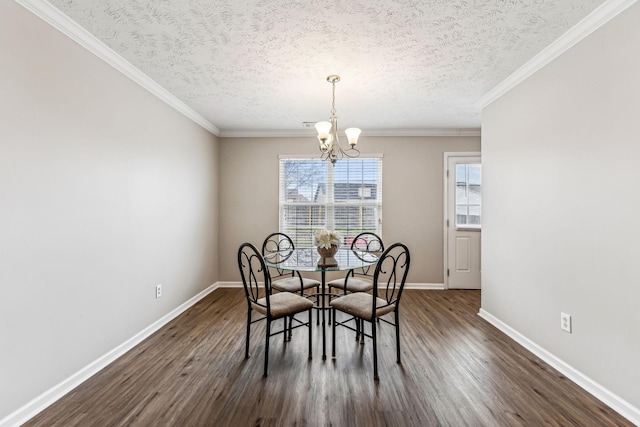 dining room with dark wood-style floors, a textured ceiling, baseboards, and an inviting chandelier