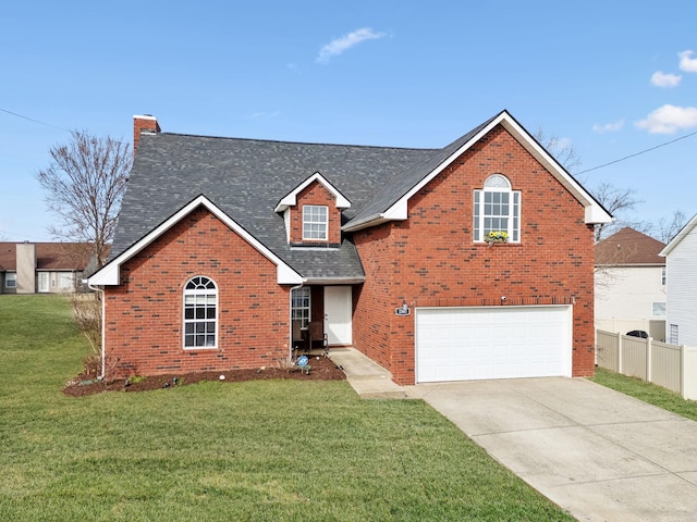 traditional-style home with driveway, an attached garage, and brick siding