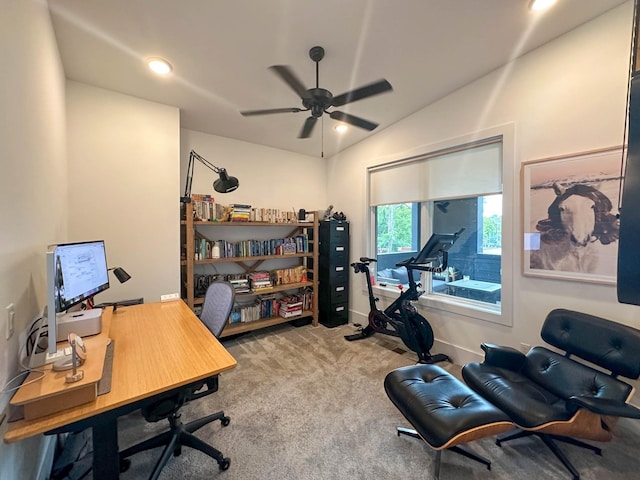 office space with carpet floors, lofted ceiling, recessed lighting, ceiling fan, and baseboards