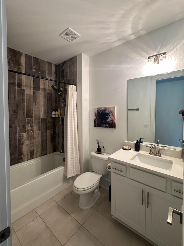 full bath with visible vents, toilet, tile patterned floors, shower / bathtub combination with curtain, and vanity