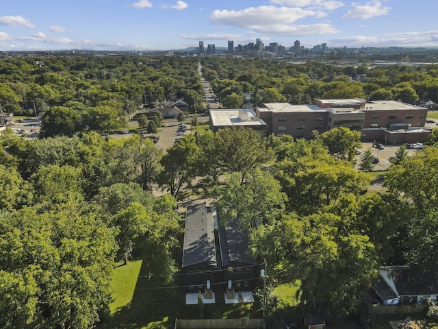 birds eye view of property with a city view