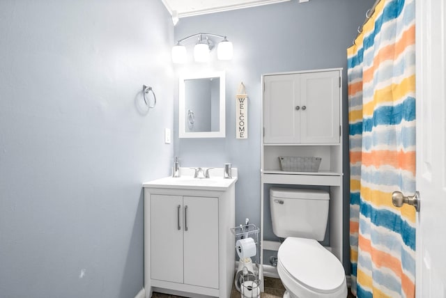 bathroom with vanity and toilet