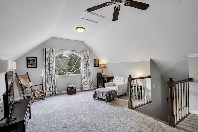 interior space featuring lofted ceiling, baseboards, carpet flooring, and an upstairs landing