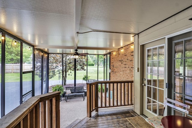 unfurnished sunroom featuring a healthy amount of sunlight