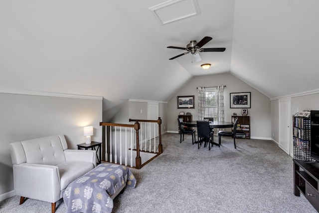 office space with lofted ceiling, carpet, baseboards, and attic access