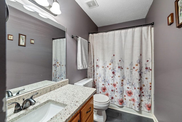 bathroom with a textured ceiling, toilet, vanity, visible vents, and shower / bathtub combination with curtain