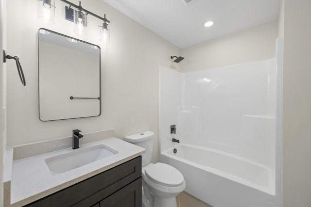 bathroom featuring visible vents,  shower combination, vanity, and toilet