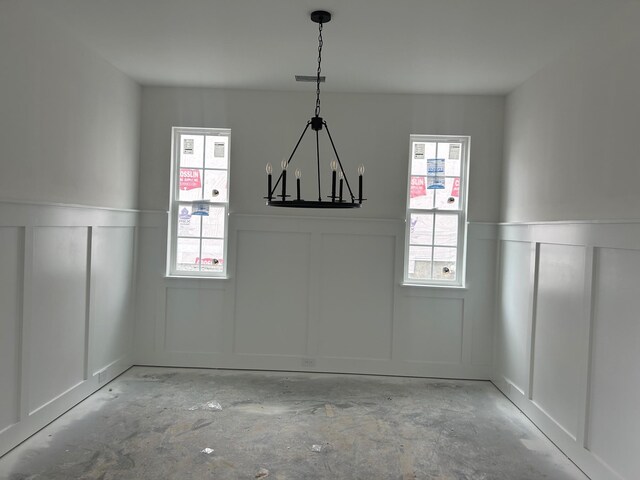 1136 Bermuda Chase St, Smyrna, TN 37167 - unfurnished dining area featuring a decorative wall, a wainscoted wall, and a chandelier