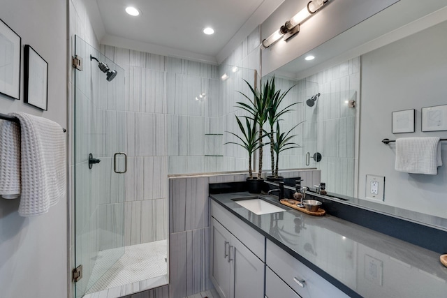 full bath with recessed lighting, a shower stall, and vanity