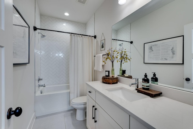 full bath with shower / bath combo, visible vents, toilet, tile patterned floors, and vanity