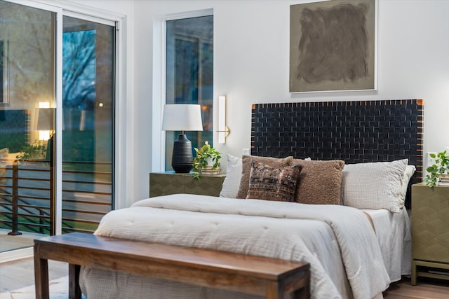 bedroom with wood finished floors