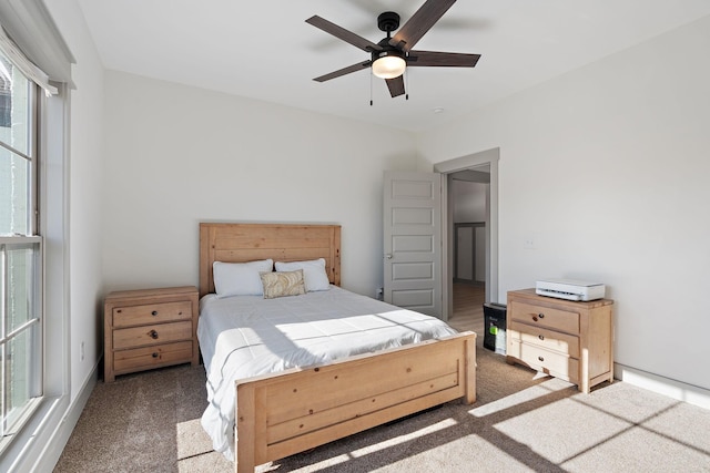 bedroom with carpet floors and ceiling fan