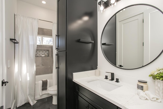 bathroom featuring toilet, tile patterned flooring, shower / bath combo with shower curtain, and vanity