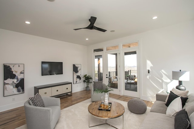 living room featuring wood finished floors and recessed lighting